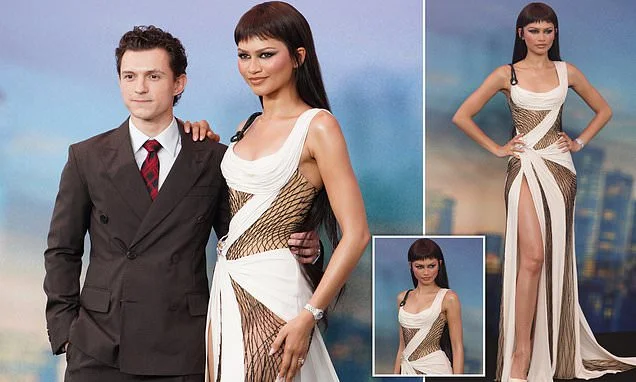 Zendaya shows off her new Cleopatra hair look and wears thigh-split 'web' dress as she and husband Tom Holland pose at the premiere of Spider-Man: Brand New Day in Shanghai