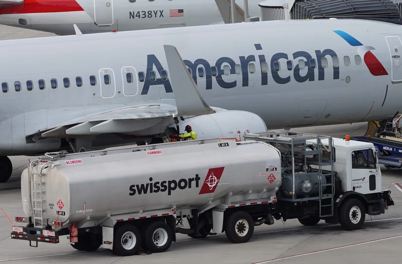 Stocks making the biggest moves midday: American Airlines, Coherent, SLB, Tesla & more