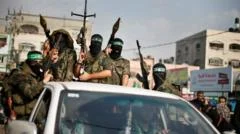 Israeli official says troops won't pull back in Gaza without 'genuine' Hamas disarmament