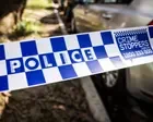 Man dies after suspected dog attack at rural property in Sydney suburb