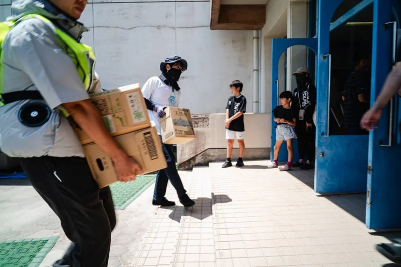 Survivors battle heat over first weekend since Kumamoto quake