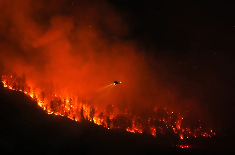 Wildfire in B.C.’s Okanagan held but nearby Summerland blaze continues to rage