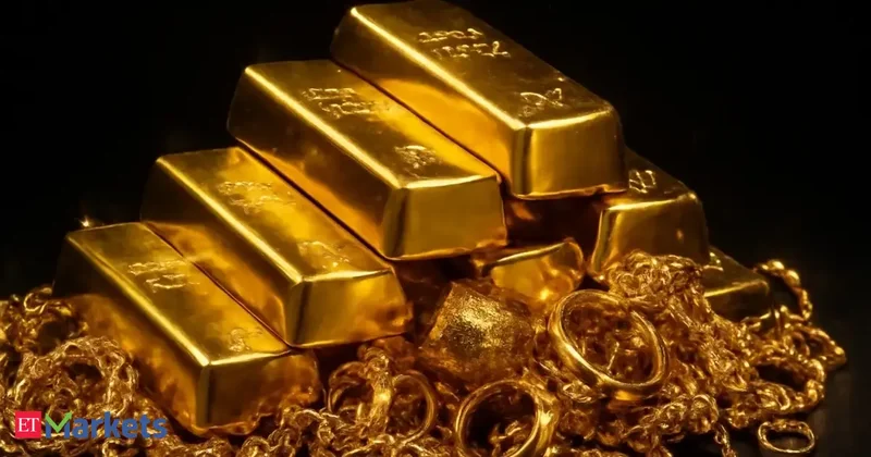 Gold edges higher on softer dollar as rate-hike expectations ease