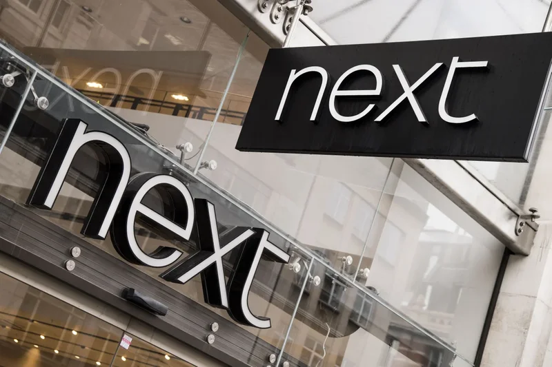 Next lifts profit outlook again after overseas and summer sales surge