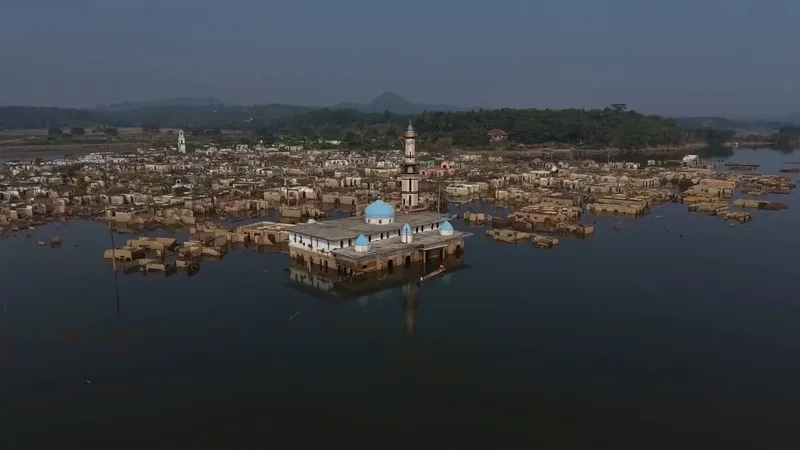 Submerged Indonesian village re-emerges as drought lowers water levels