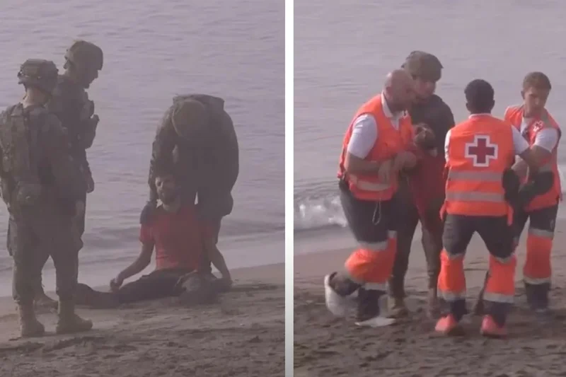 Collapsed migrant who swam to Ceuta aided by troops and medics amid border rush crisis