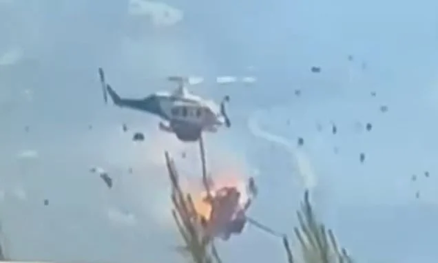 Two helicopters collide while fighting wildfires in Greece