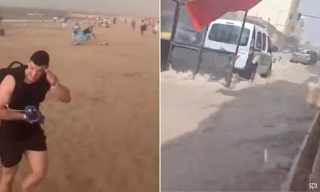 Moment freak thunderstorm batters Spain - seeing tourists run for cover as streets turn to rivers