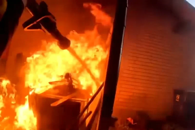 Firefighter bodycam shows Washington homes consumed by wildfire as 60,000 evacuated
