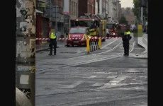 Gardaí convince man who climbed crane in Dublin city centre to come down