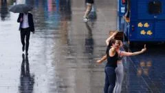 UK to turn cooler with rain after exceptional heat and dry spell