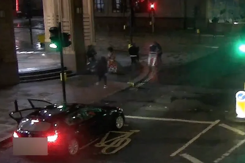 Moment knife-wielding gang members emerge from BMW before attacking four people and stealing watches