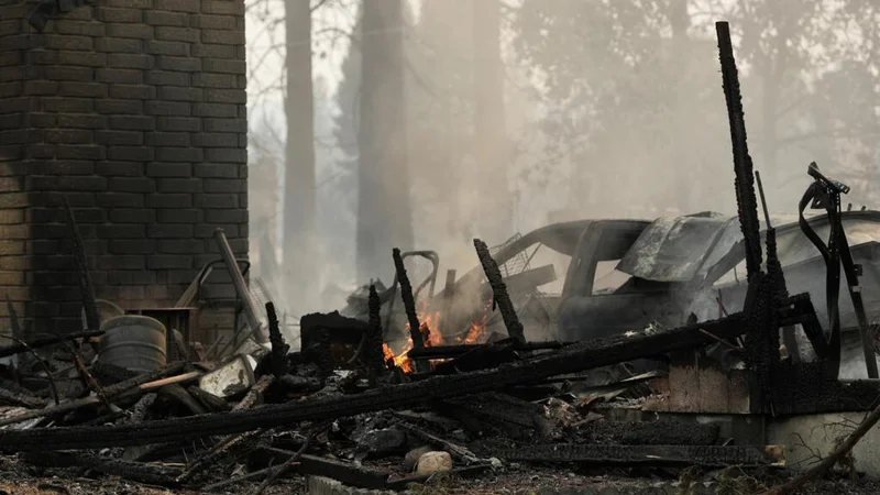Arson suspected in devastating US wildfire that forced 60,000 to evacuate