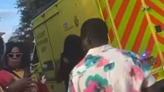 Three in hospital after fire and crush at festival in London