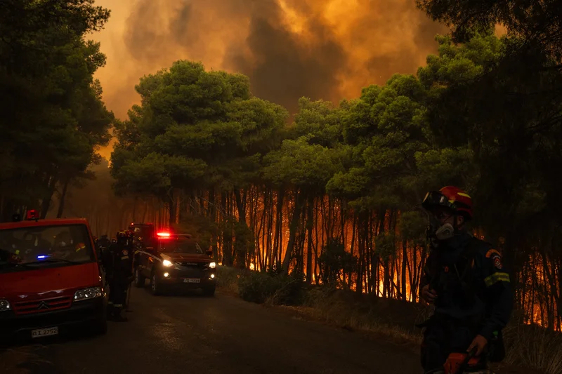 Wildfires rage in Greece as firefighters continue battle in France and Spain