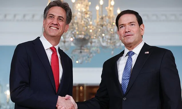 'Ed Miliwatt' arrives in Washington: Miliband awkwardly dodges questions over whether he still thinks Donald Trump is a 'racist' and 'misogynist' as he meets US counterpart Marco Rubio