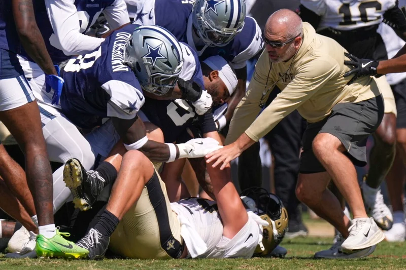 Ronnie Bell carted off because of heat as fights break out during Saints-Cowboys joint practice