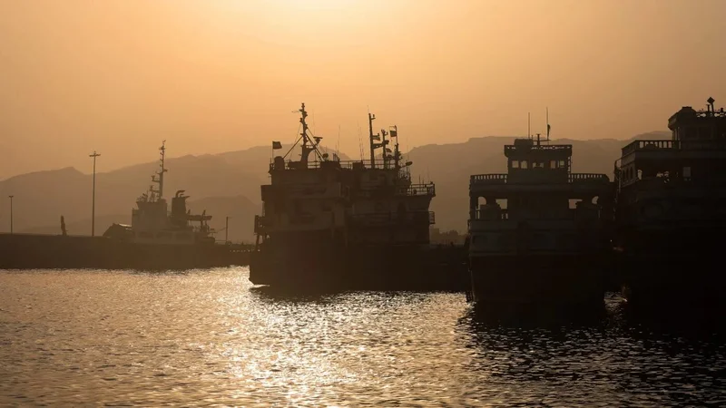 Iran and Oman work on temporary Hormuz shipping route as Trump threatens to claim the strait