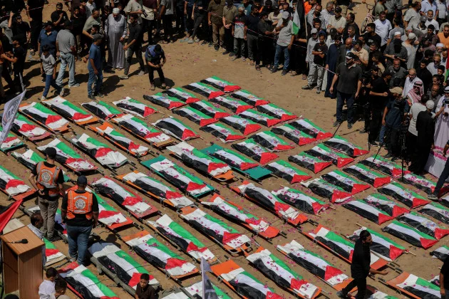 Funeral held in Gaza for more than one hundred people pulled from rubble years after they died