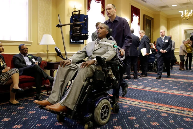 O.J. Brigance, who won a Super Bowl with the Baltimore Ravens before battling ALS, dies at age 56