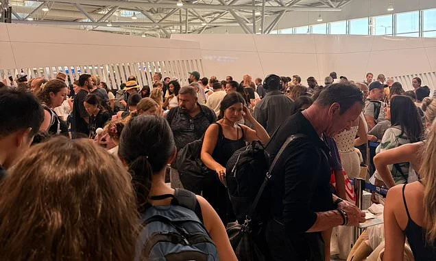 'It's a nightmare': Tourists face hours-long queues at Athens airport as EU border system buckles under pressure - amid warning of missed flights