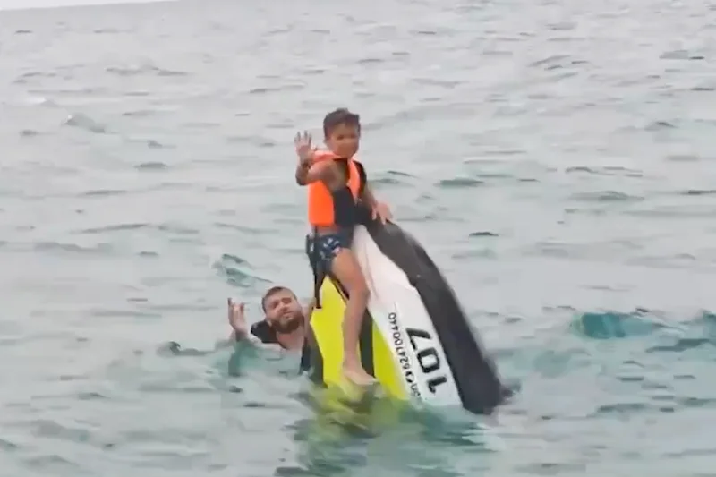 Lost father and sons found clinging to half-sunken jetski after 16 hours at sea