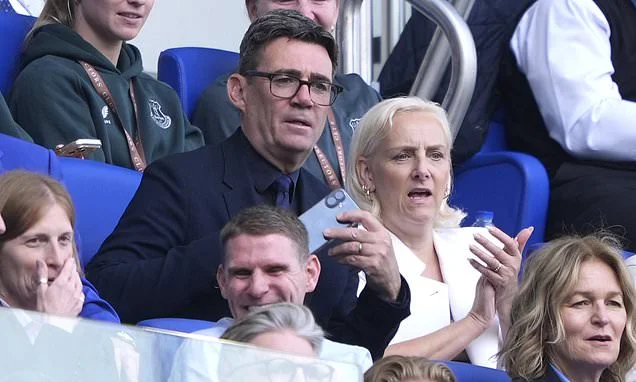 Burnham's latest U-turn as he moves into the directors' box for Everton match - despite vowing to stay in his normal seat