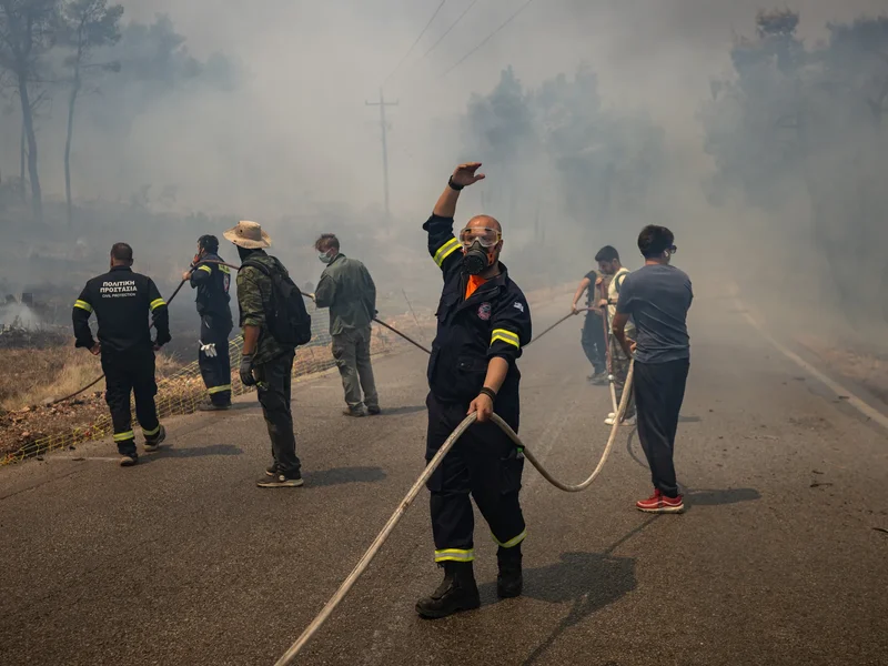 Firefighting helicopters collide near Athens as Greece battles wildfires