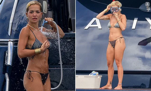 Rita Ora shows off her incredible figure in a mismatched bikini before enjoying a spot of snorkelling during sun-soaked yacht trip with pals in Ibiza