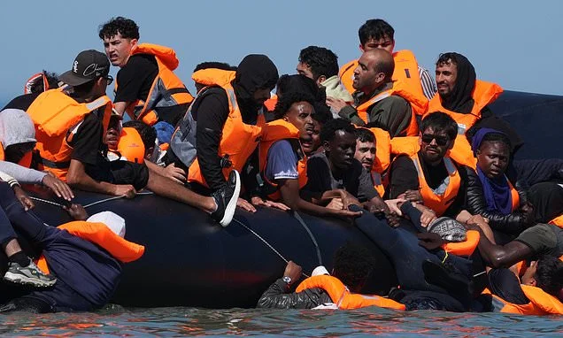 Tories attack Britain's largest social housing provider for supporting controversial charity handing out freebies to Channel migrants