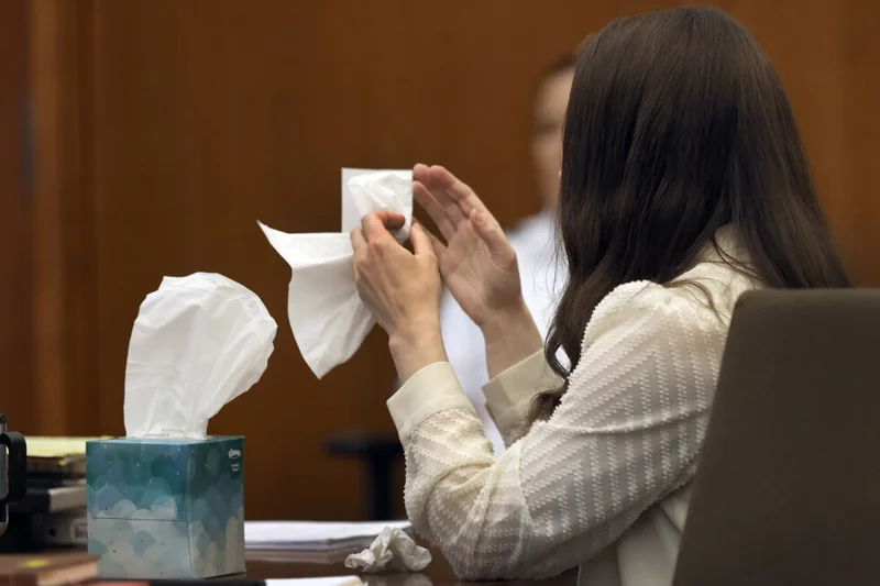 Lindsay Clancy sobs during murder trial as jurors view autopsy photos of her youngest child