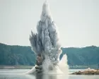 Romanian navy blows up rock in Danube to redirect water to nuclear plant – video