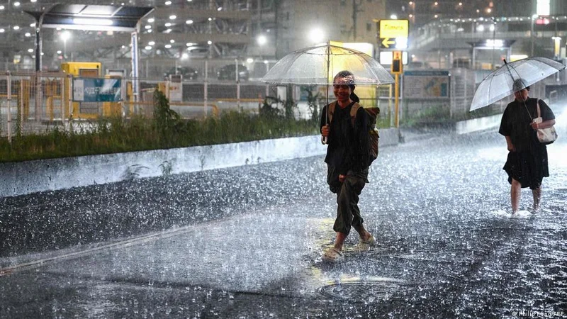 Four dead, thousands stranded as record rain lashes Japan