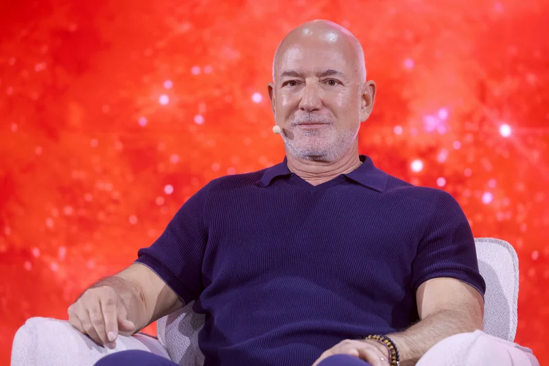 Group including Jeff Bezos buys minority stake in Liverpool FC, with option to become controlling owner
