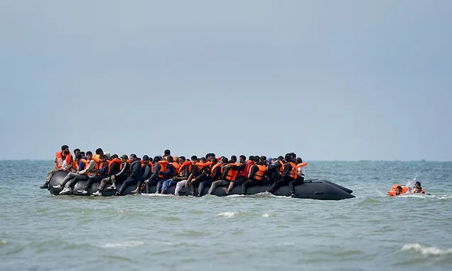 Small boat record smashed again as 230 migrants smuggled into Britain on 'mega dinghy' - despite Labour claims its 'smash the gangs' policy is working