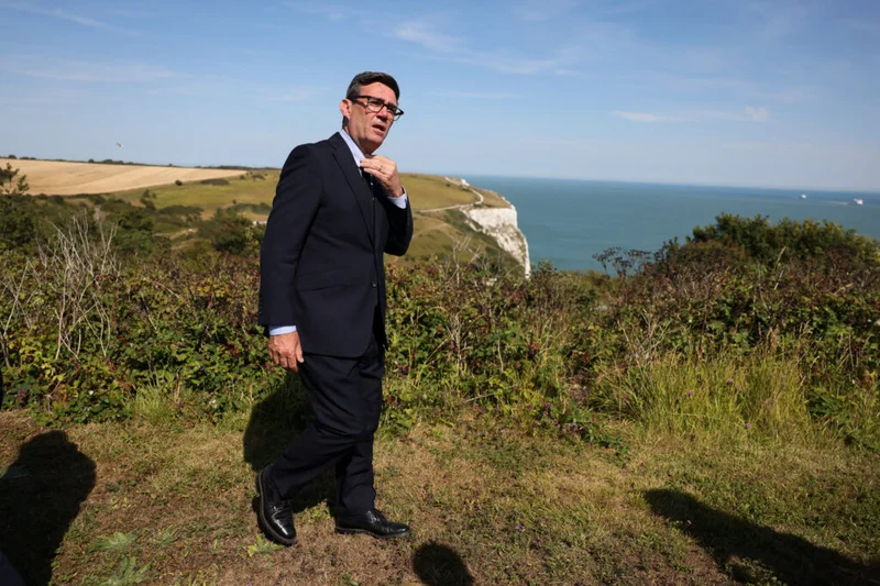 Nigel Farage is under siege. That’s just how he likes it.