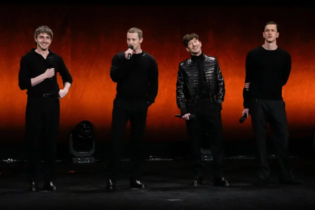 Beatles biopic stars seen recreating the iconic Abbey Road album cover in London