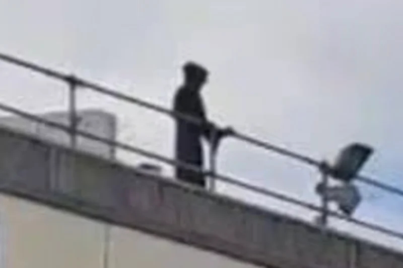 Man arrested after dressing as Grim Reaper on hospital roof and staring at patients