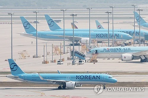(LEAD) Asiana shareholders approve merger with Korean Air