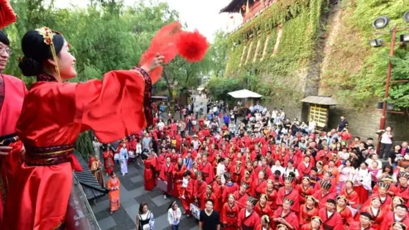 Chinese custom sees women throw embroidered balls from balconies to choose husbands