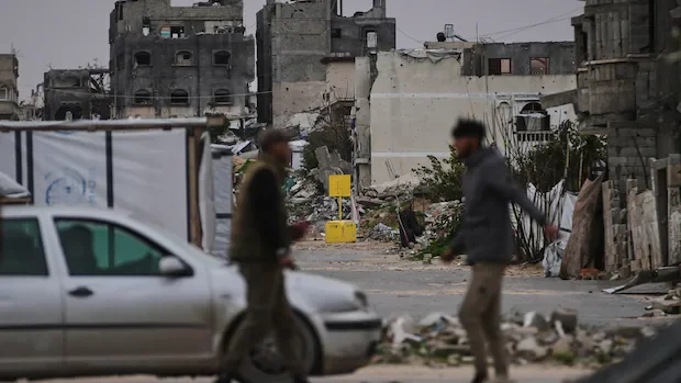 As Israel’s military advances its yellow line, Gazans fear they’re being pushed to the sea