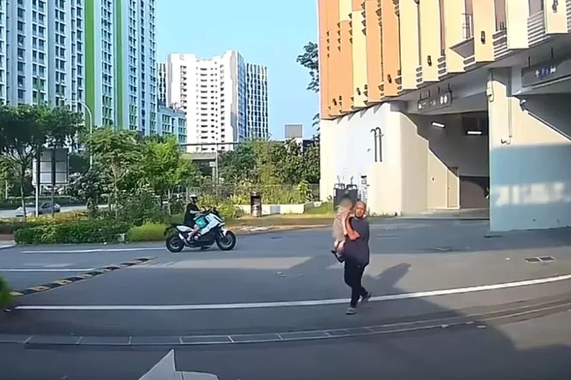 Man stops toddler seen walking alone on road at Punggol Coast Mall