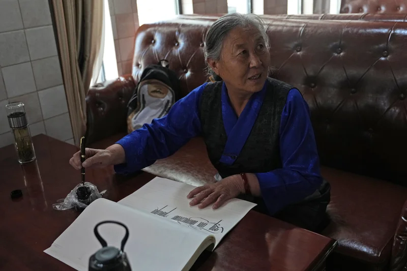Under China's new 'unity' law, Tibetans fight to preserve language and culture