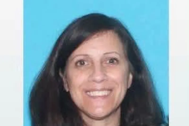 Woman who wrote book praising police officers is wanted after cop died in her home