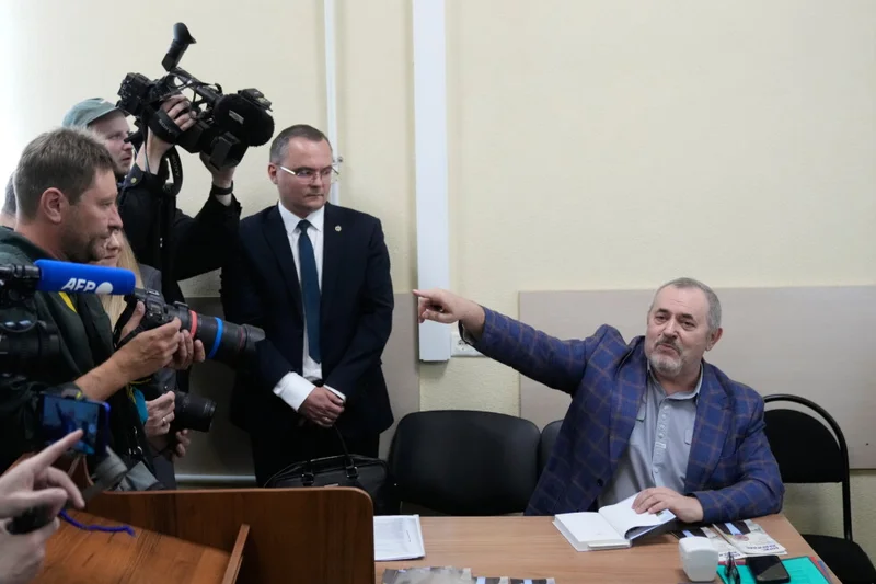 A Putin critic leaves Russia after he is barred him from running for parliament