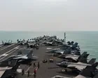 First Thing: US aircraft carrier arrives to relieve USS Lincoln amid reports of poor living conditions