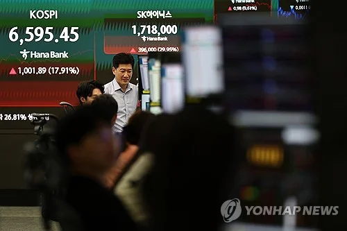 Seoul stocks open sharply lower after record surge on profit-taking