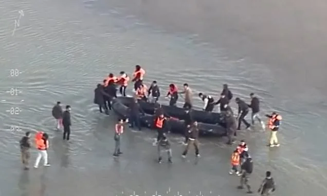 Violent migrants clash with police as they try to set sail for the UK from French coast