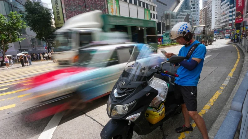 Why are Hong Kong delivery drivers unhappy about proposed payouts for injuries?