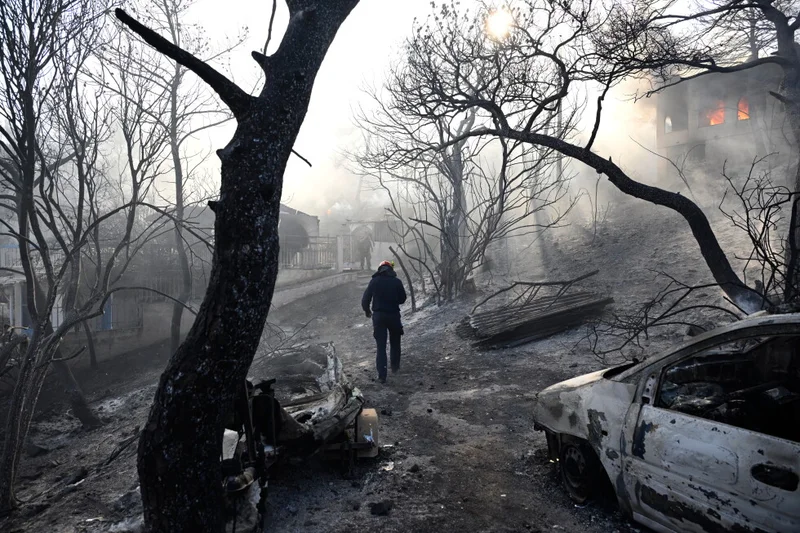Belgian wildfire approaches Germany despite rain as Greece probes deadly blaze